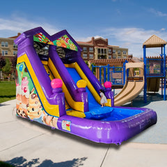 Colorful inflatable slide with cartoon designs on a playground