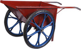 A red wheelbarrow with spoked wheels and tyres