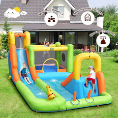 Children playing on an inflatable water slide and play
