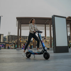 Woman riding an electric scooter in an urban Area