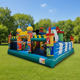 Colourful inflatable playground structure in a park area.
