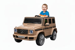 Model of a child riding Mercedes-Benz G-Class SUV Mini Jeep