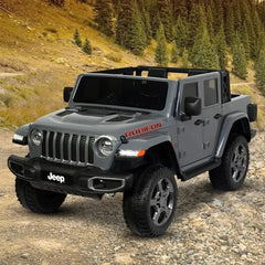 Grey Mini Jeep Rubicon on a rocky trail 12v with Parental Remote Control