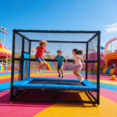 Children playing on a trampoline in an outdoor playground