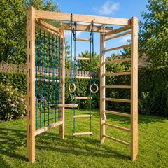 Outdoor wooden obstacle playground structure with a climbing wall, rope net, ladder, rings, and steps