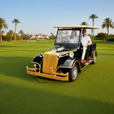 Two people in Vintage-style Electric Golf Cart Classic Cruise Vintage