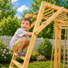 A young boy climbing a wooden playset ladder.