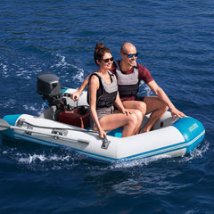 A man and a woman sit in a Bestway Hydro-Force Caspian Sport Boat