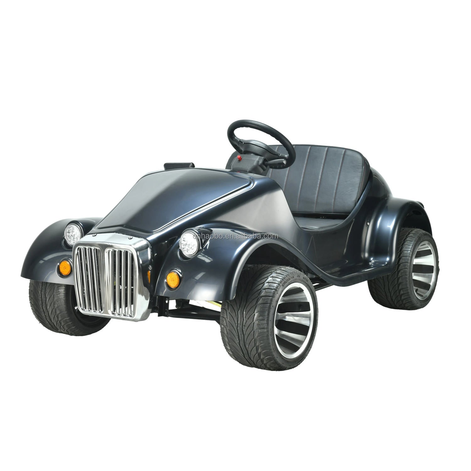 A black convertible ride-on buggy off road car styled like a vintage American roadster, featuring a black seat, black tyres with silver rims
