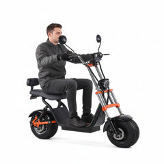 an adult riding a fat tyre kugoo harley electric scooter