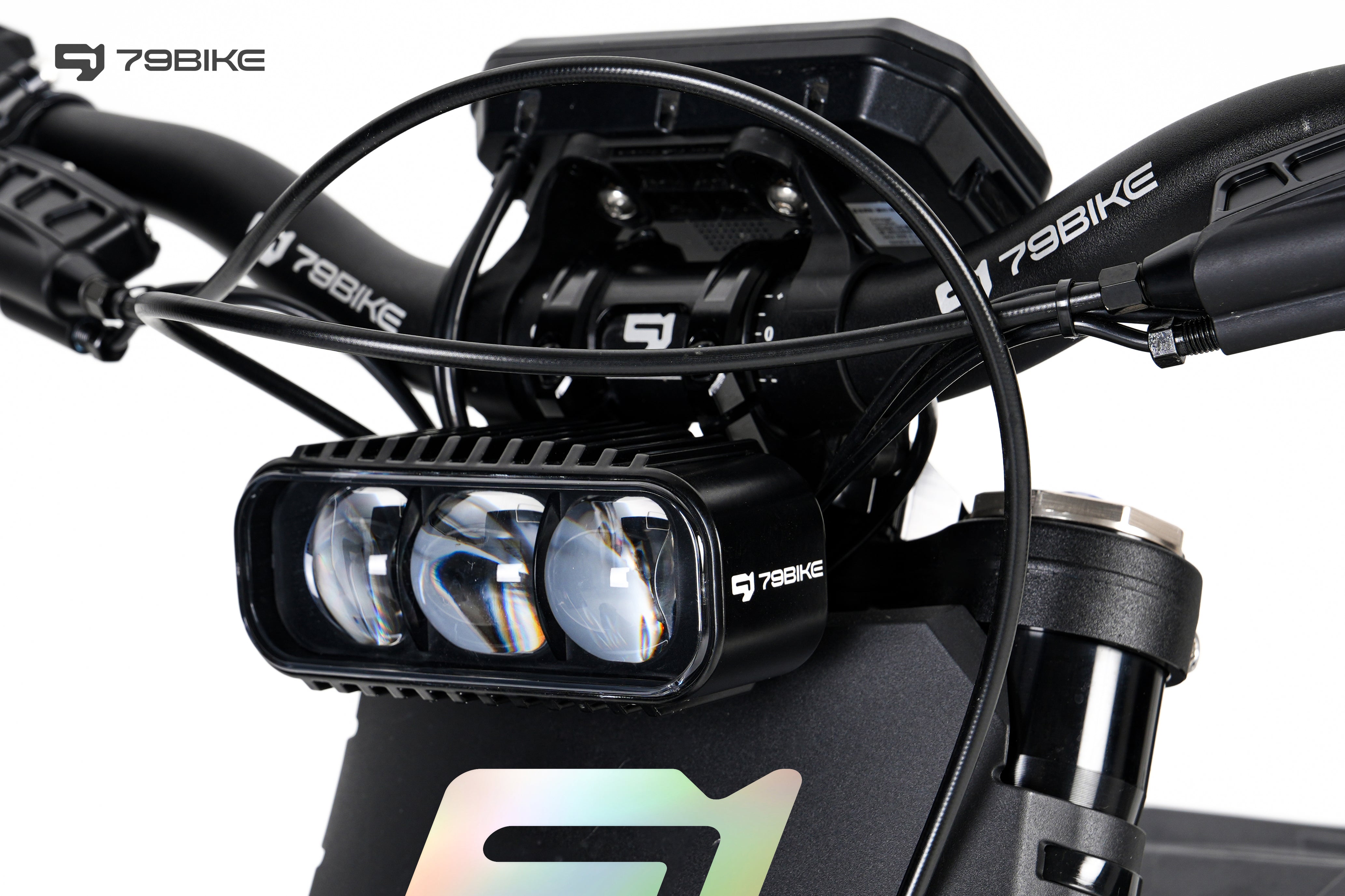 Close-up of a bike handlebar and a light attachment.