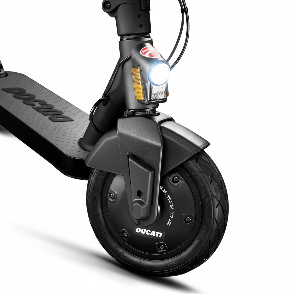 Close-up of a Ducati scooter wheel with visible branding