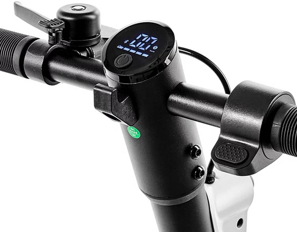 Close-up of a motorcycle handlebar with digital display and control buttons 