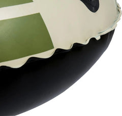 Close-up of a black and green inflatable ring with a white border.