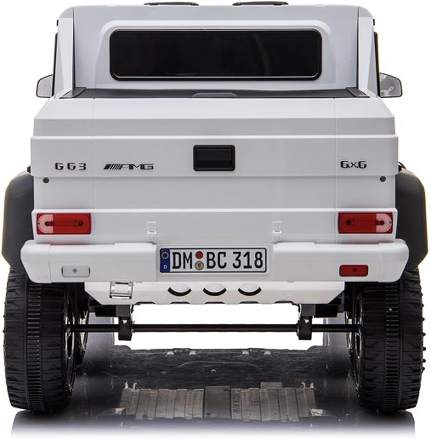 Back view of a white off-road vehicle with AMG 