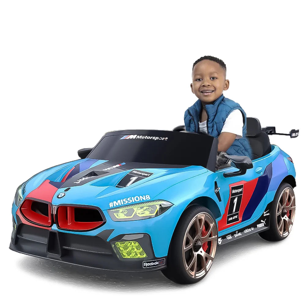 Child sitting in M8 GTE Style Racing Car for Kids