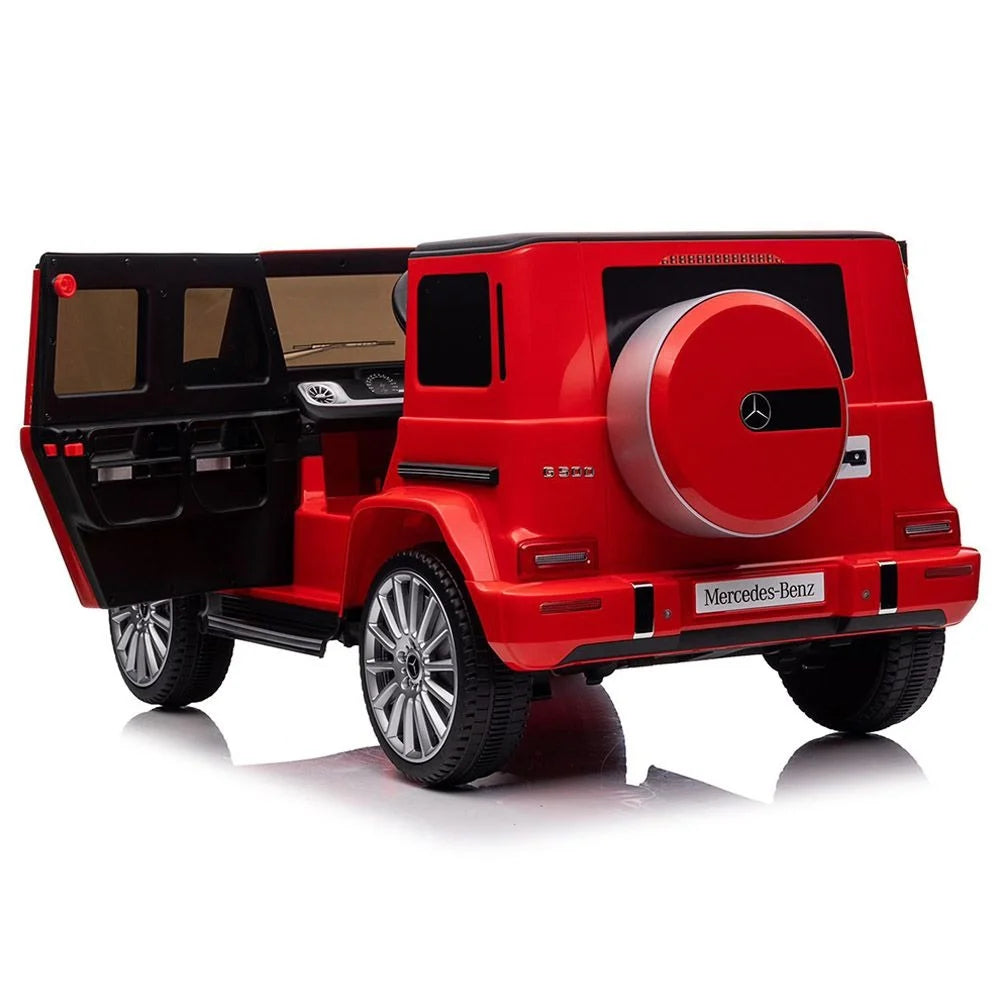 Red toy Mercedes-Benz vehicle with open door