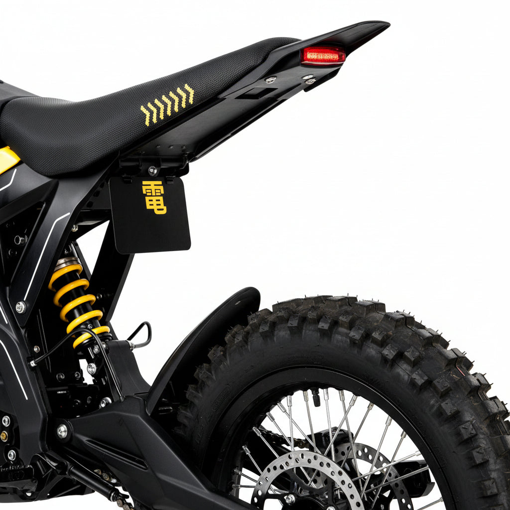 Close-up of a black and yellow electric bike with Seat