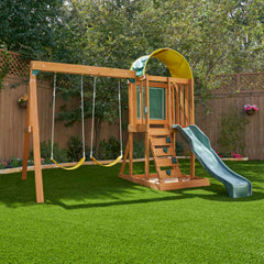 Kidkraft Ainsley Outdoor Playset with swings and slide in a backyard setting