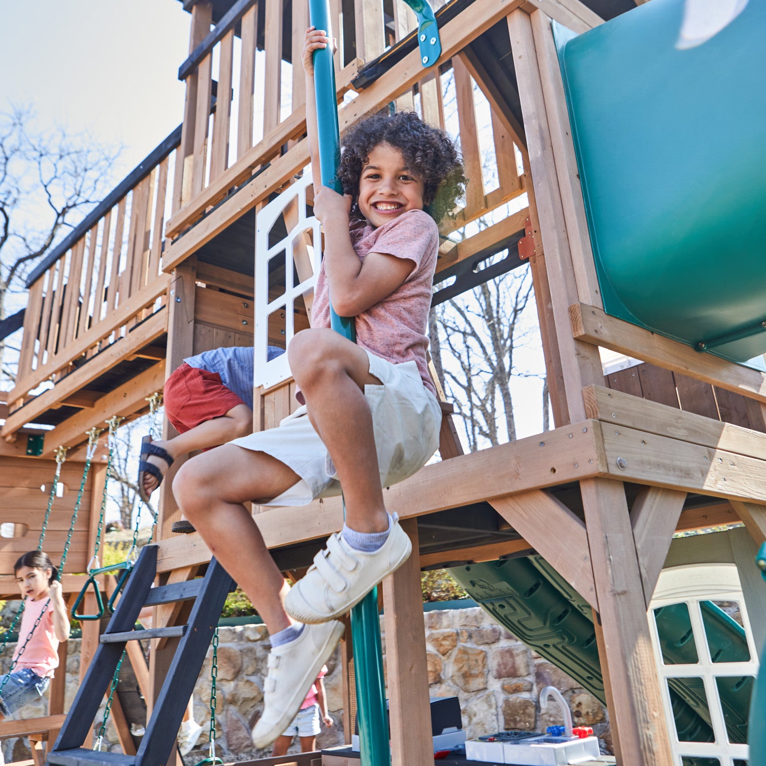 Treetop Observatory Wooden Swing and Slide with boy