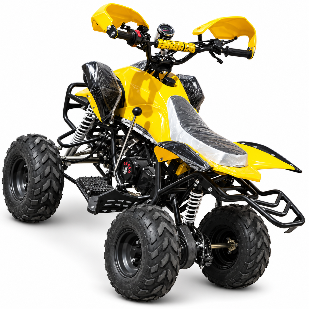 A yellow mini ATV quad bike with protective plastic wrapping on its seat.