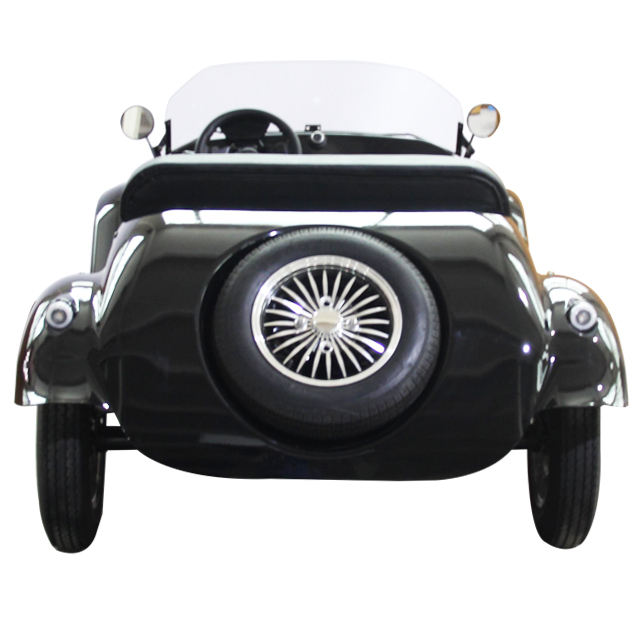 Black vintage-style three-wheeled car