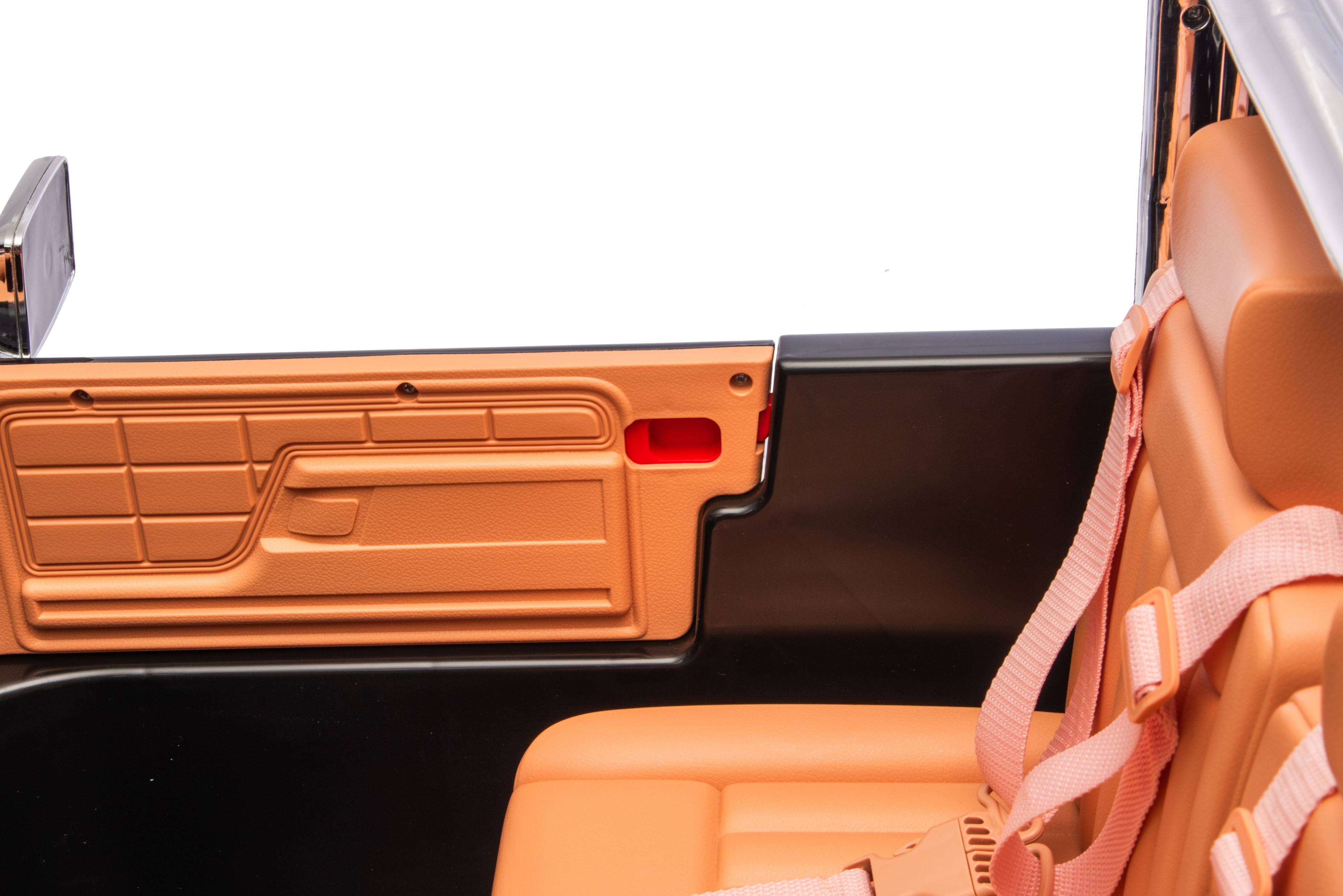 Close-up of a car interior with a Leather seat and door open.