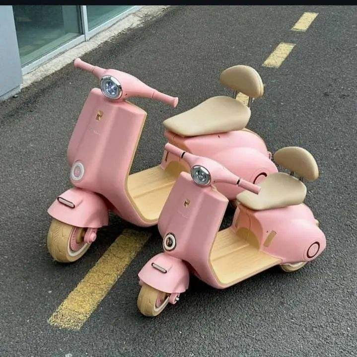 Megastar Ride on 12 v Vespa Scootz Bike for Kids with Parental RC