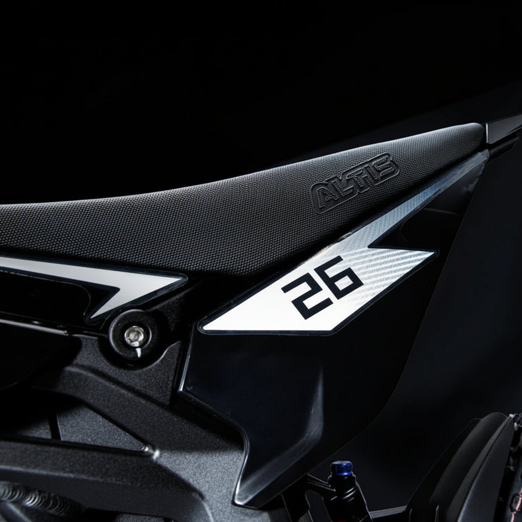 Close-up of a motorcycle with number 26