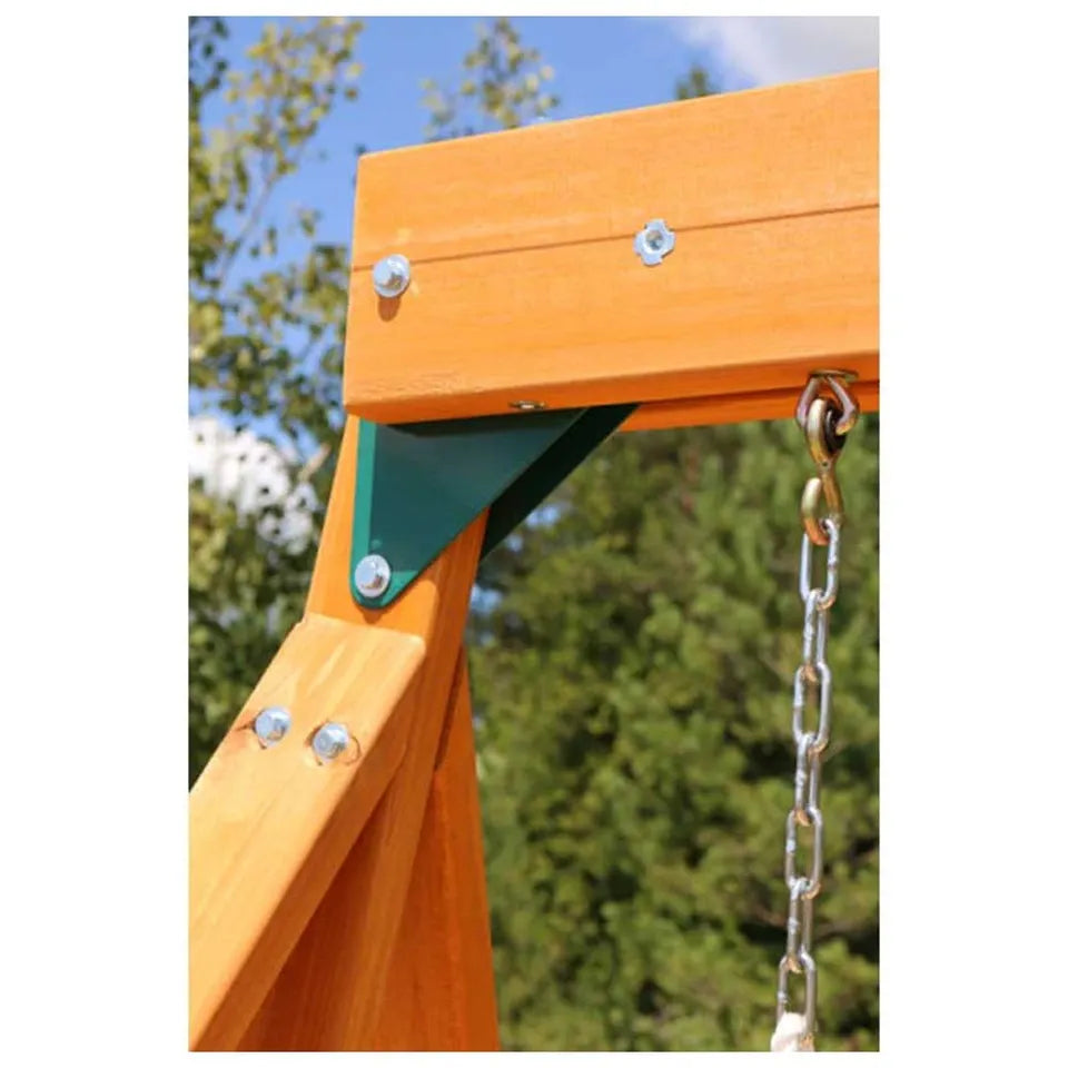 Close-up of a playground swing with a wooden seat and metal chain against a blurred natural background.