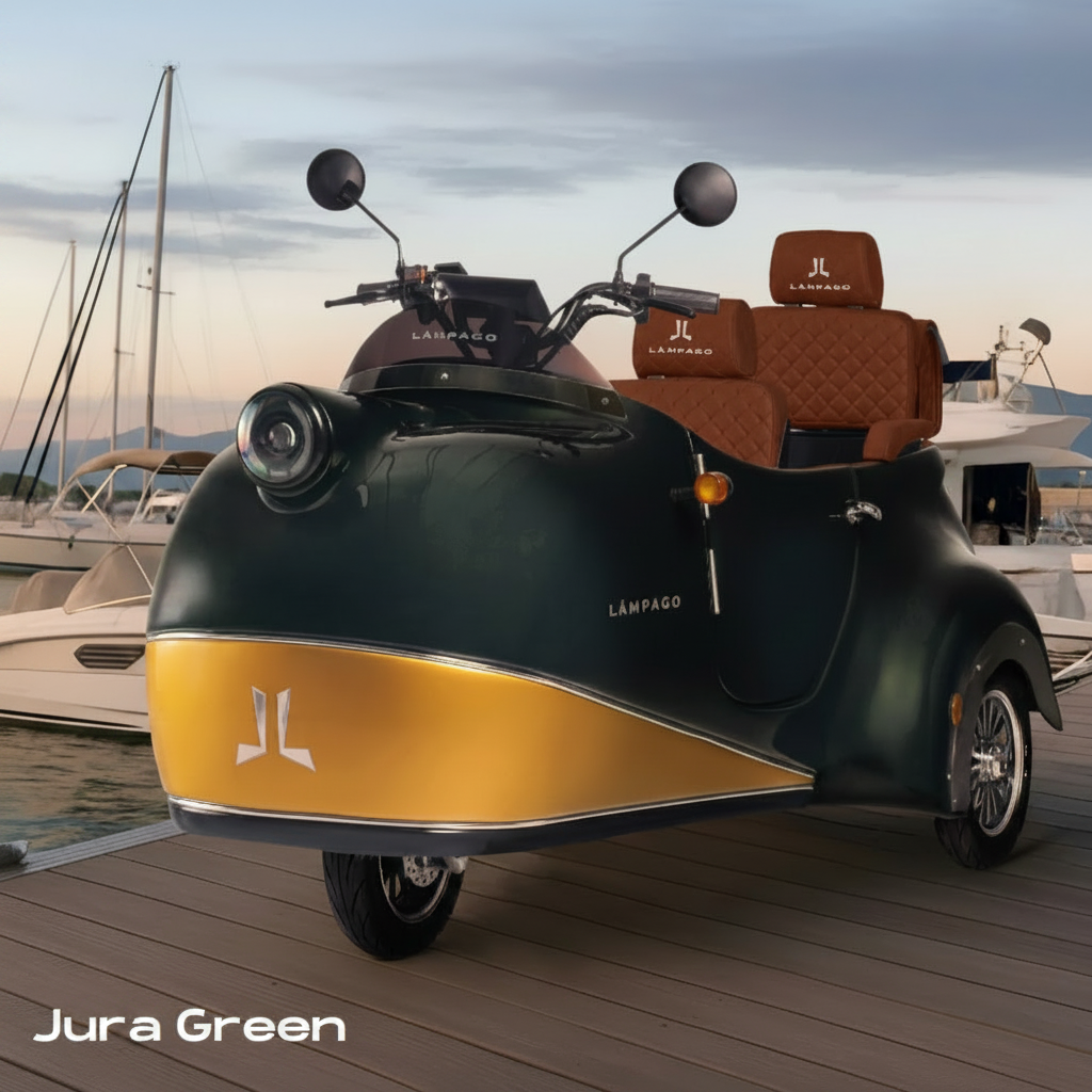 A Jura Green trike features a glossy dark green body with a gold-colored 