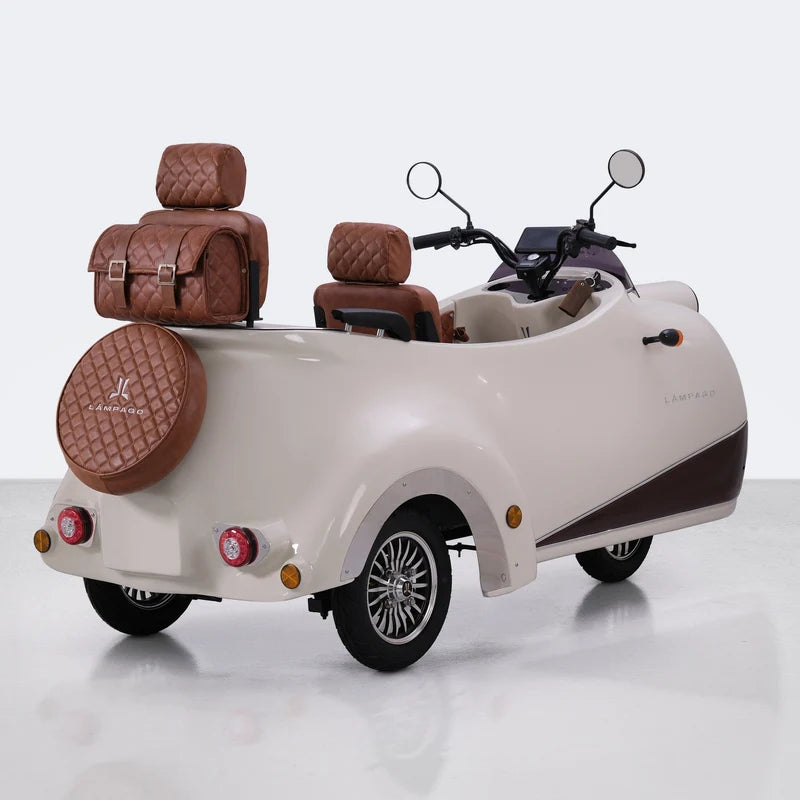 Electric tricycle Scooter with a cream-colored body, brown quilted leather seats and saddlebags