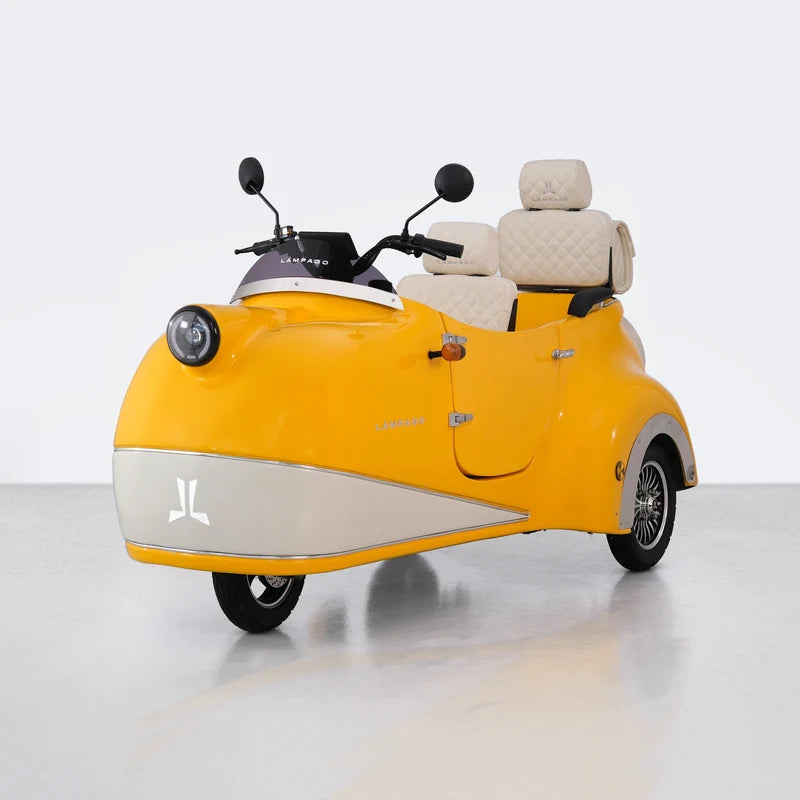 A  yellow three-wheeled Electric Mobility Scooter for City Riding