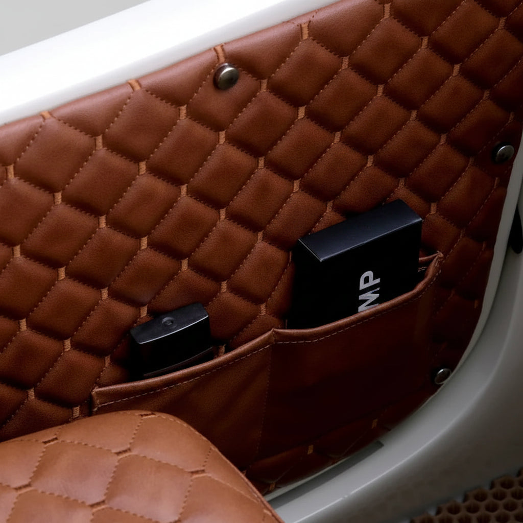 A close-up of a brown quilted leather Electric Scooter pocket organiser