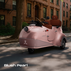 A Blush Pearl Electric Scooter with Premium Brown Quilted Leather Seats