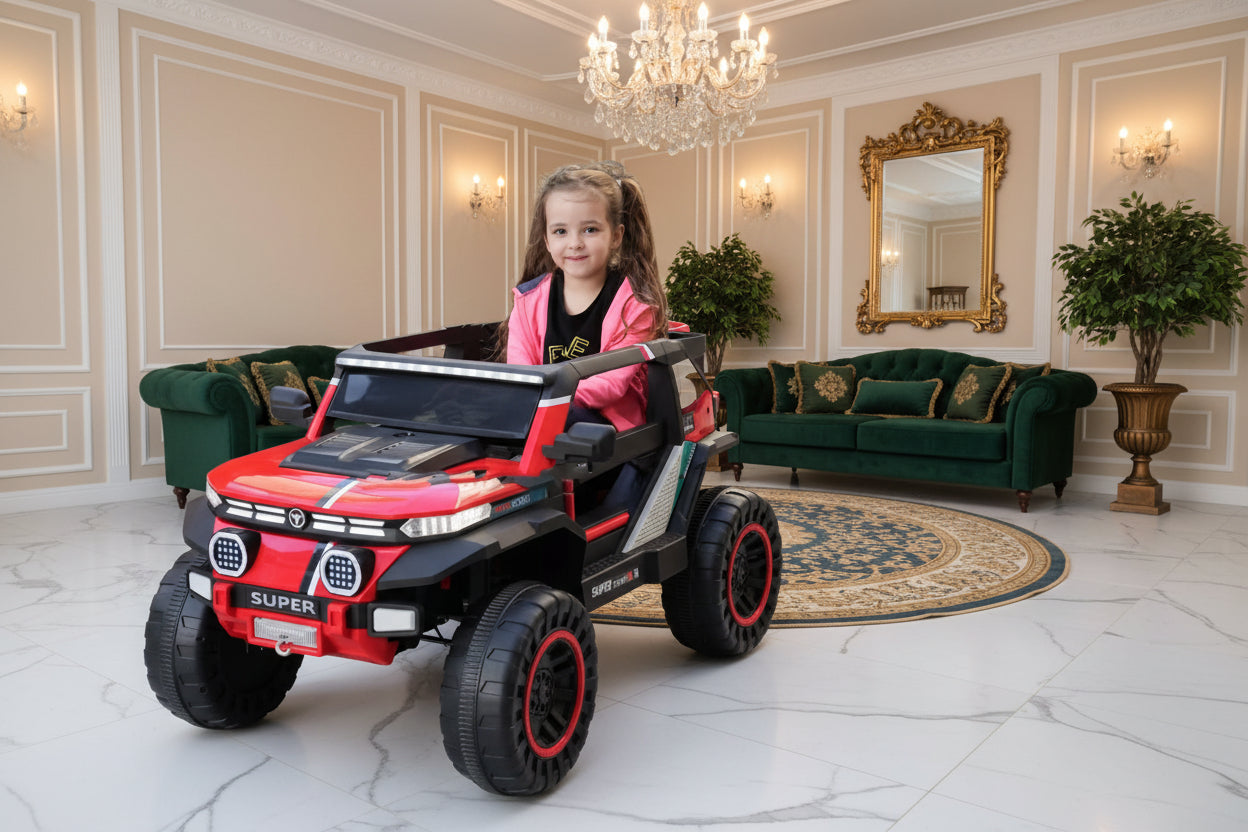 A child sitting in a red Kids car