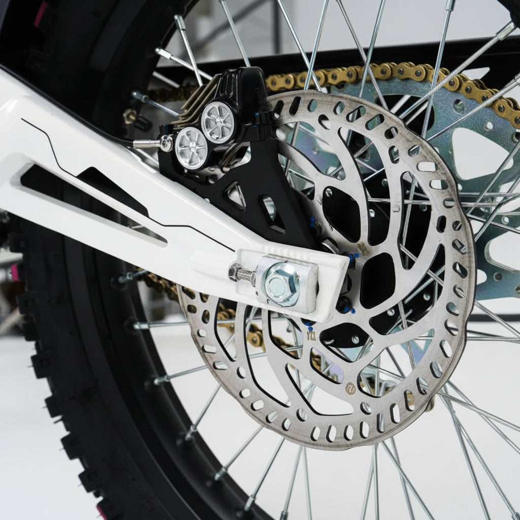 Close-up of a motorcycle chain and sprocket system