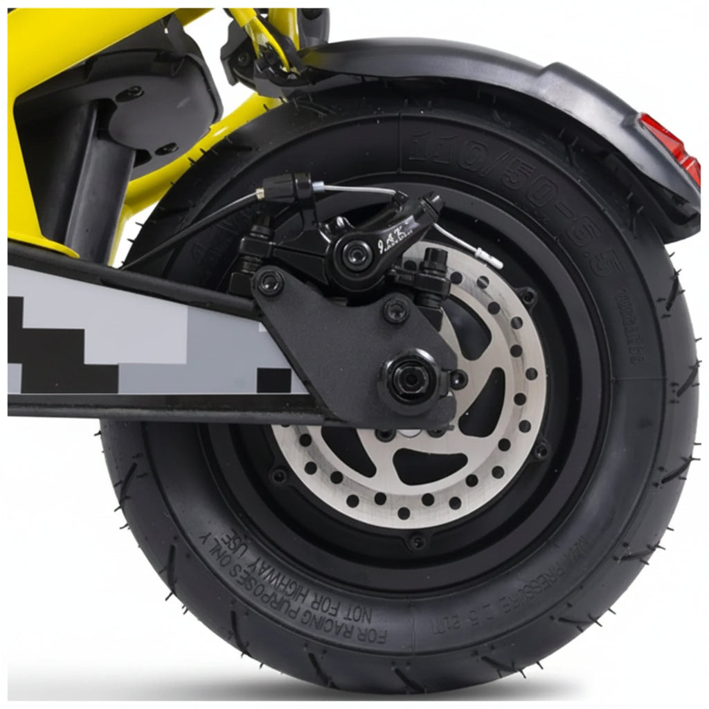 Close-up of an electric scooter wheel with suspension and brake components