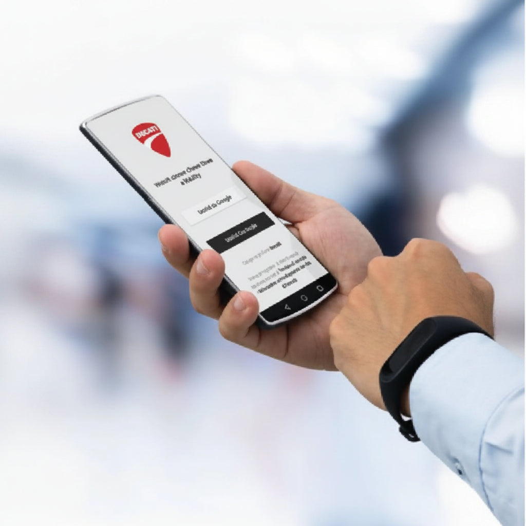 A Man holding a smartphone with a Ducati app