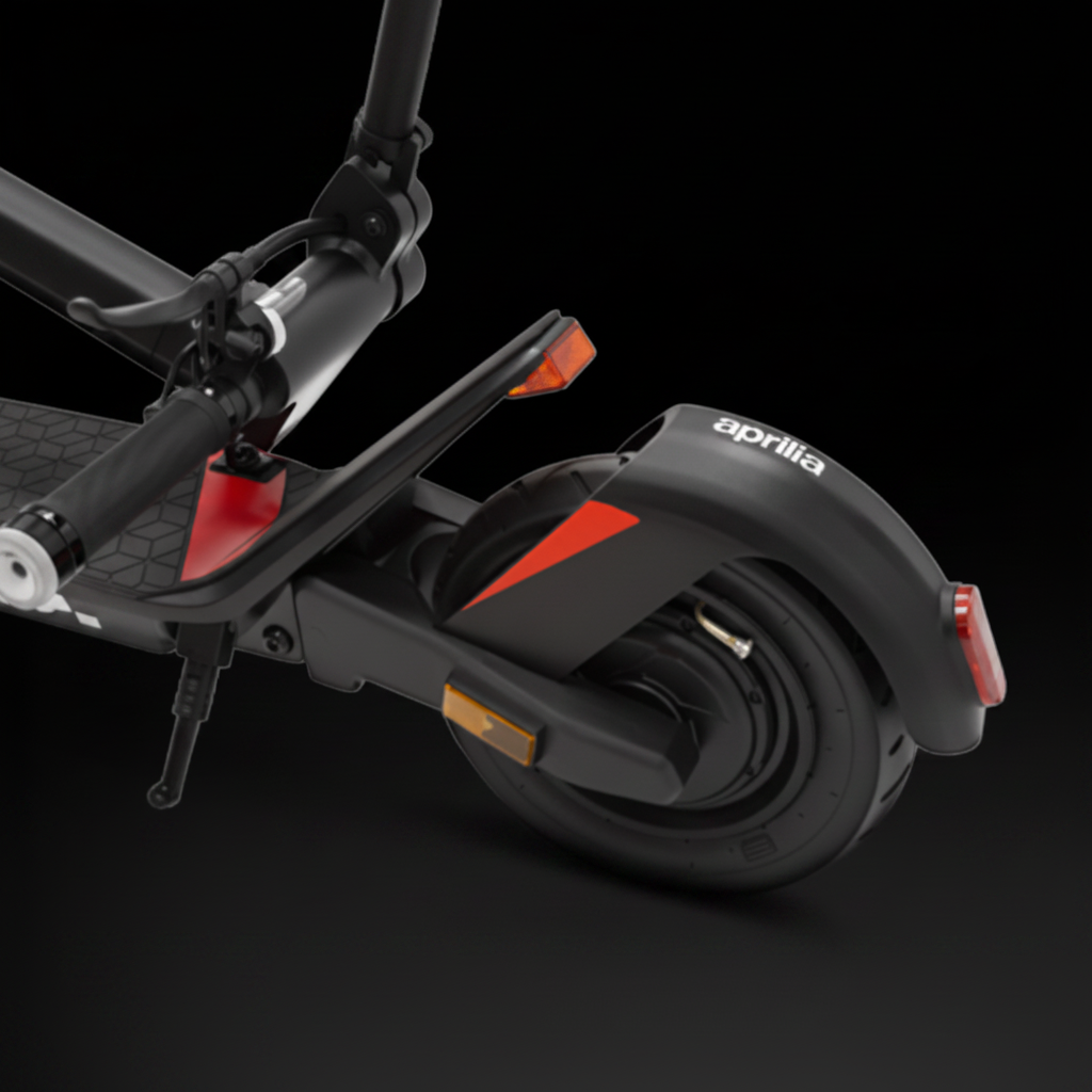 Black electric scooter with red accents on a black background