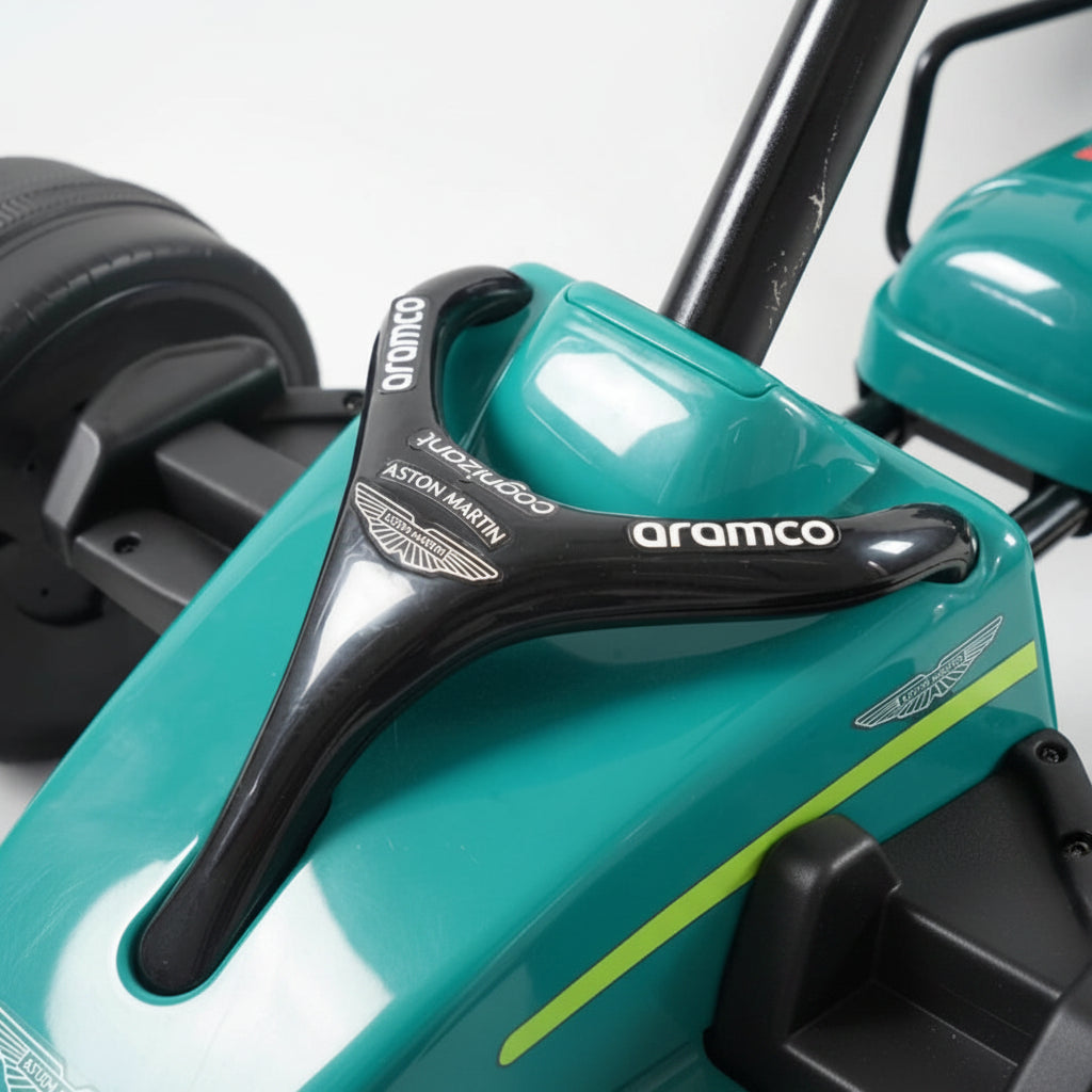 Close-up of a teal Aston Martin car 