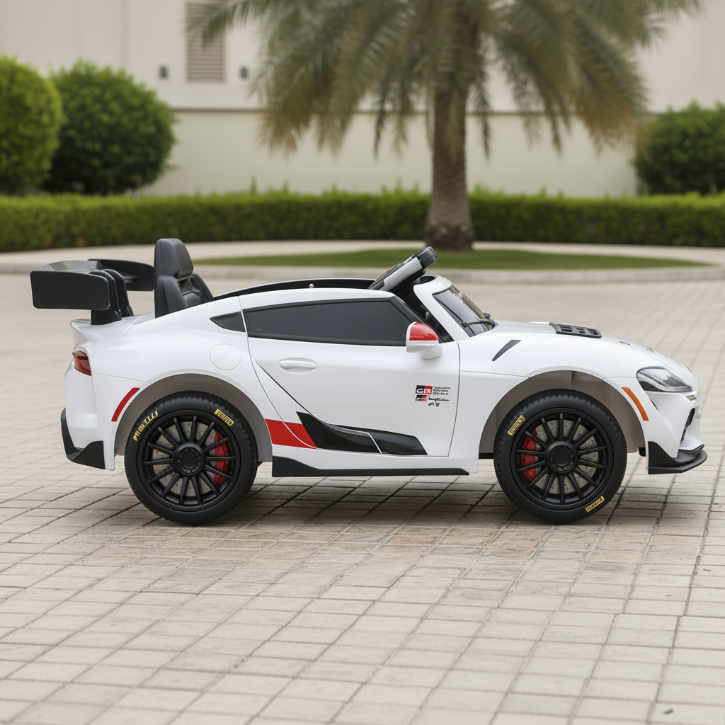 Side view of  white Toyota GAZOO Racing ride-on toy car styled Supra GT3