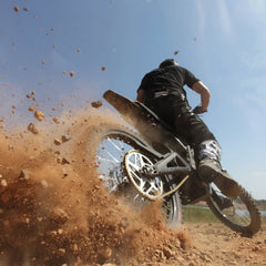 Talaria Desert Beast off-road electric motorcycle side view
