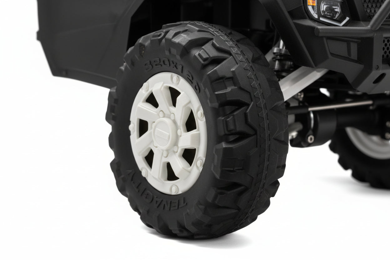 Close-up of an off-road tyre with a white rim