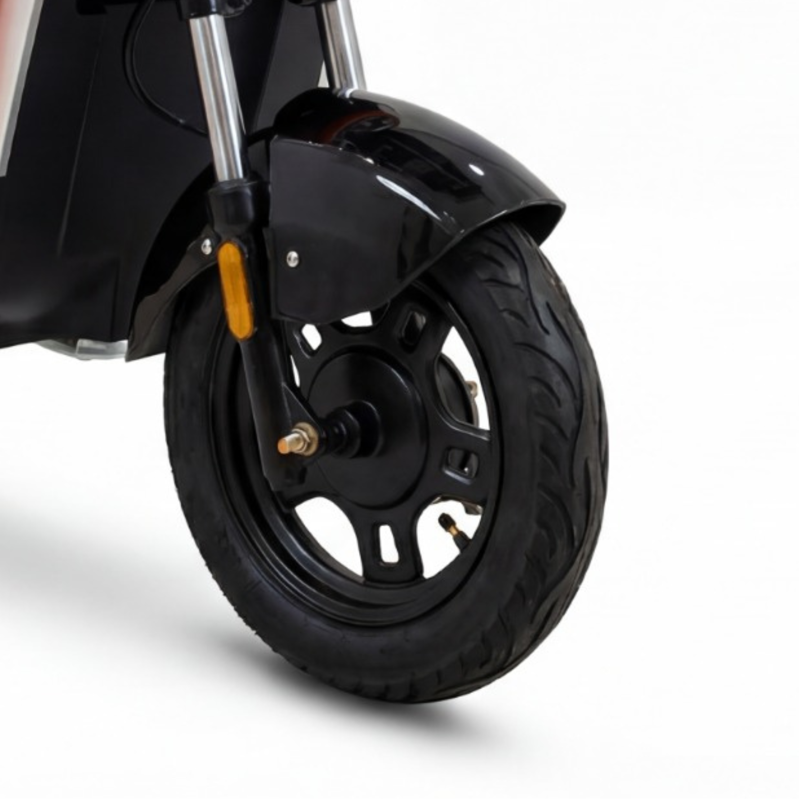 Close-up of a motorcycle wheel with a black tire and rim 
