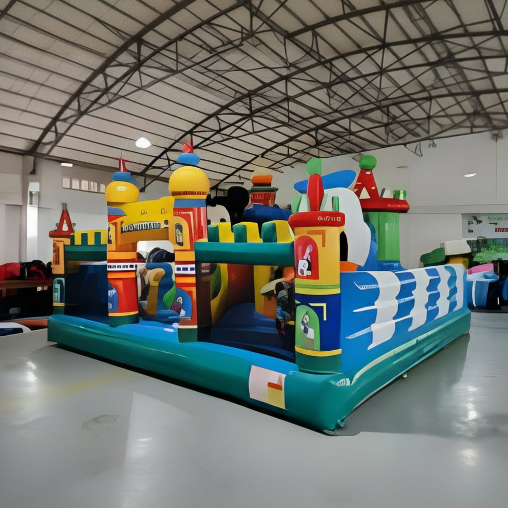 Colorful inflatable playground structure in a large indoor area.