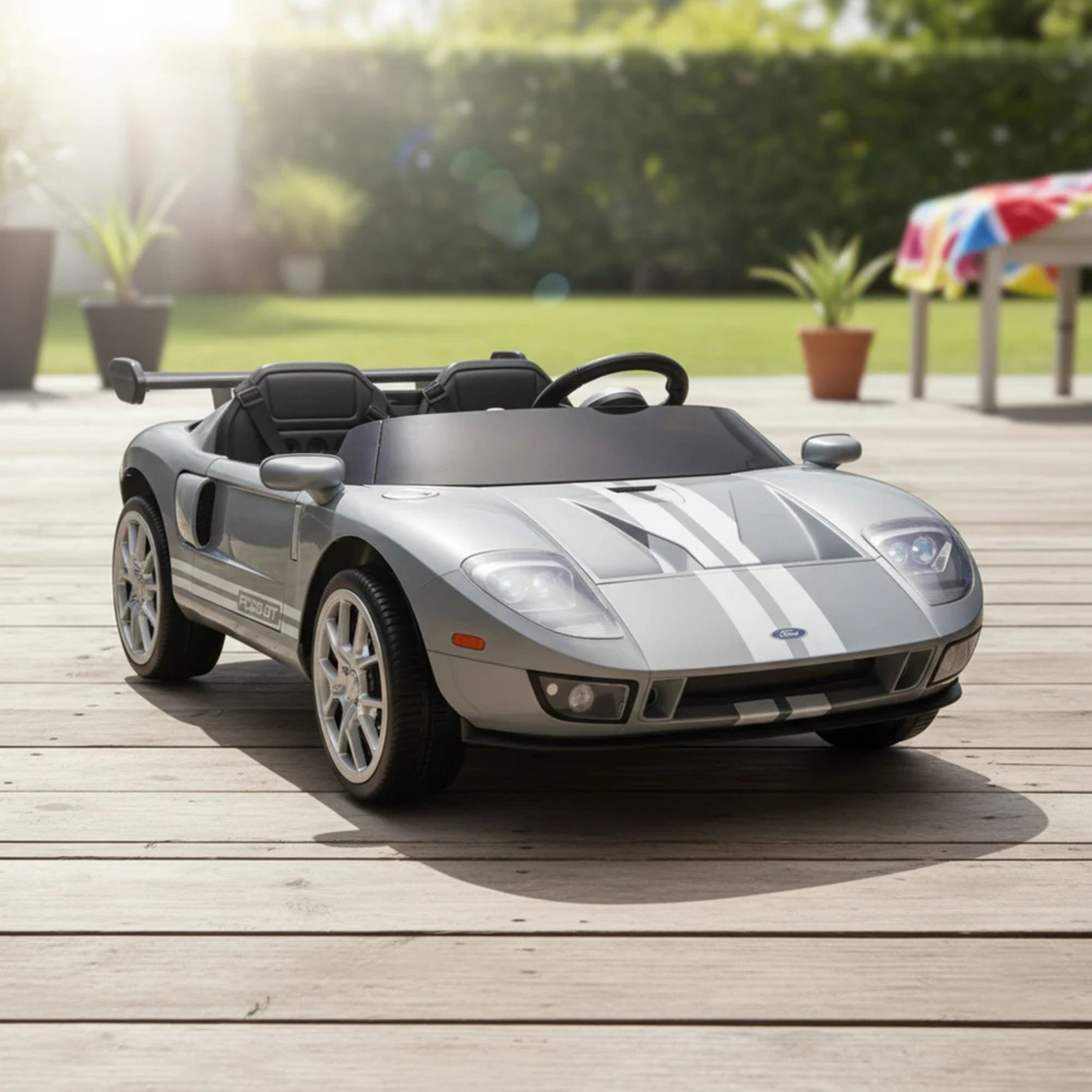 Grey toy car, Licensed Ford GT Electric Car on a wooden deck