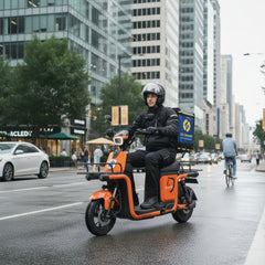 Person riding an Kugoo T3 Electric Bike Cargo 700W 48V 20A Max Speed 42Km/h, 1 Year Warranty at Rafplay