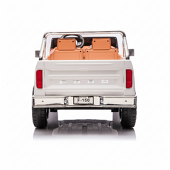 back of a white Ford truck with an open bed