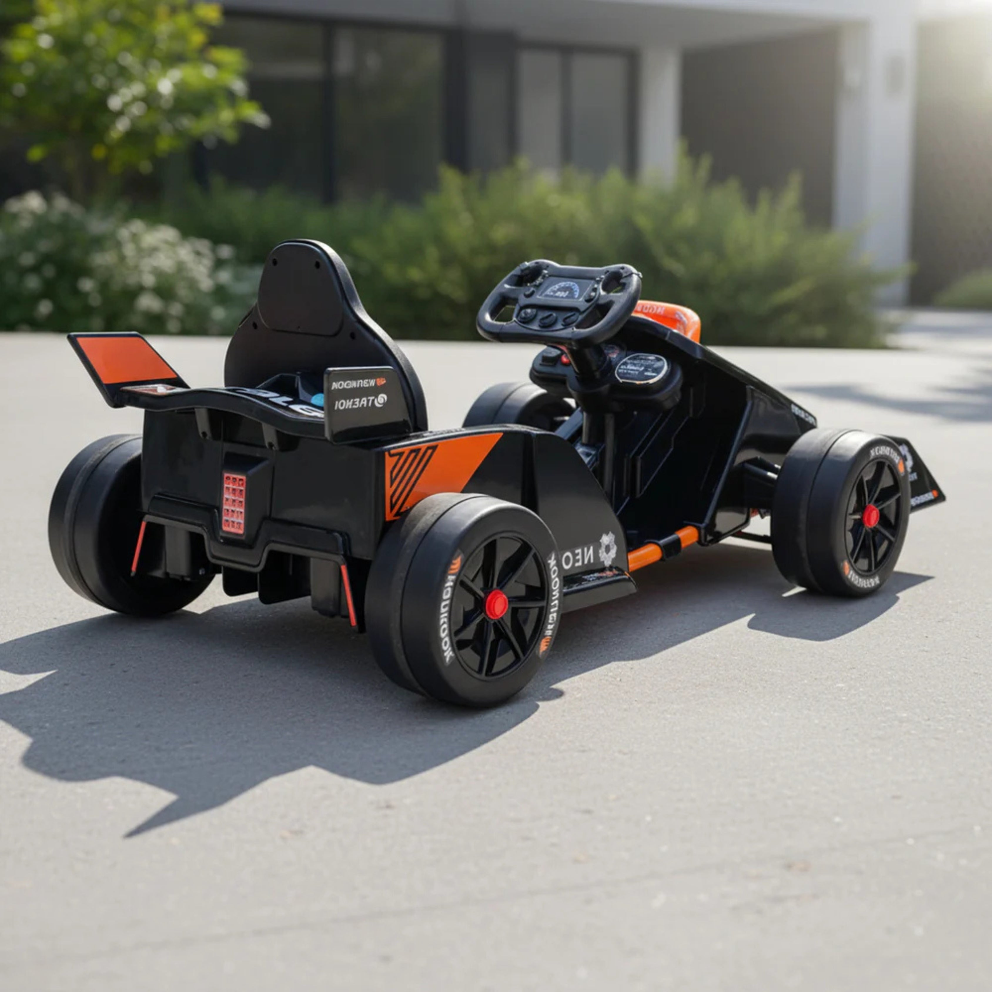 Black and orange toy race McLaren F1 Electric Car